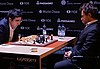 Wladimir Kramnik (li.) und Lewon Aronjan, Kandidatenturnier Berlin 2018, 10. Runde.jpg