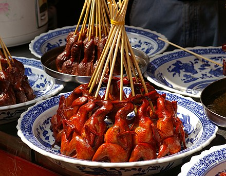Skewered quail is common street food in Qibao Town, Shanghai.