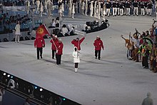 Photographie de l'entrée de la délégation kirghize lors de la cérémonie d'ouverture.