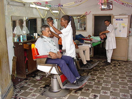 Independent, family-owned barbershops are a hallmark of Santiago