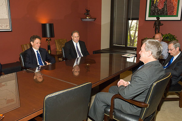 Baucus (foreground) meets with Secretary of Treasury nominee Timothy Geithner(left)