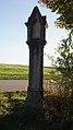 Čeština: Boží muka kamenná pilířková u bývalé cesty z Hůr do Úsilného v okrese České Budějovice. English: Stone column shrine at the former road between the villages of Hůry and Úsilné, České Budějovice District, Czechia.