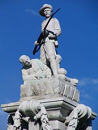 This is the Boer War Memorial in Dunedin. It is stark white and demonstrates New Zealand's patriotism by showing a man defending his fellow soldier.