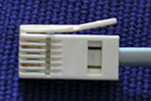 British telephone plug with only two pins present (2 and 5), from a modem cable BritishPhonePlug.jpg