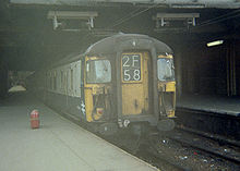 The front of a Class 309 train in blue/grey BR livery with original 'wrap around' cab windows at London Liverpool Street station Class-309-Blue-Gray-Original-Windows-Liverpool-St-Stn.jpg