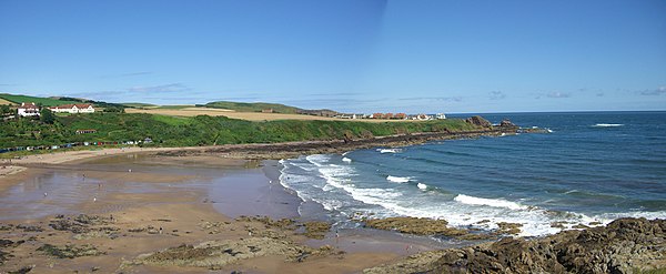 A panorama shot of Coldingham Sands from Homeli Knoll, the village of St Abbs is just visible over the headland. Coldingham Sands panorama 2.jpg