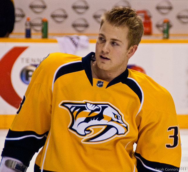 Photographie de Colin Wilson avec les Predators de Nashville