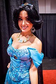 A cosplay performer dressed in full costume as Jasmine.