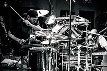 Drummer Dave Lombardo, who appeared on Testament's eighth studio album The Gathering, rejoined the band in 2022 as the replacement of Gene Hoglan.