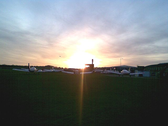 View of the apron and tower during sunset