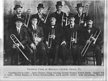 Trombone Choir of the Moravian Church in Emaus, Pennsylvania, c. 1900. Two in the front row are holding soprano trombones. Emaus-trombone-choir.jpg