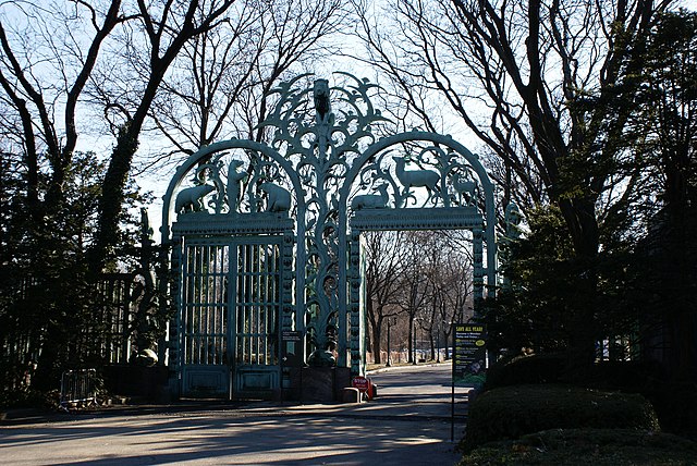 Historical Fordham Road Entrance to the Bronx Zoo featuring Rainey Memorial Gates