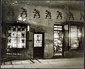 Exterior view of The Crumperie and The Treasure Box at night, ca. 1918-1920. (9564902140).jpg