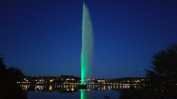 The fountain in Fountain Park is lighted with LED lights during holidays and special events. There are eight colors available to shine on the spray.