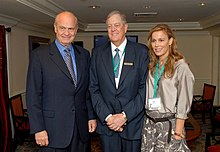 Fred Thompson poses with David Koch and his wife Julia Koch.