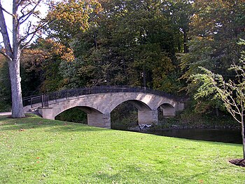 Rainbow Bridge, which stretches over Wolf Creek and connects upper and lower campus. Gcc rainbow bridge.jpg