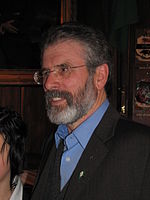 Sinn Fein president Gerry Adams, in a letter to the Attorney General for Northern Ireland, described the Tandragee killings as "a barbaric act" Gerry Adams Easter Lily Badge.jpg