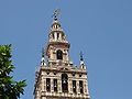 Detail des Turmes von Osten. Glocken in den Arkaden (v. l. n. r.): Santa Inés (8), San Juan Evangelista (7), San Pedro (6), San Laureano (5) und San José (4). In der Laterne: Matraca, dahinter: Campana del reloj (A).