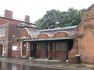 Finds from the excavation of the long barrow have been placed on display in Guildford Museum Guildford Museum Entrance.jpg