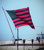 David Hammons' 1990 piece African-American Flag was added to the set