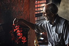 Flower seller in a temple Varanasi Benares India