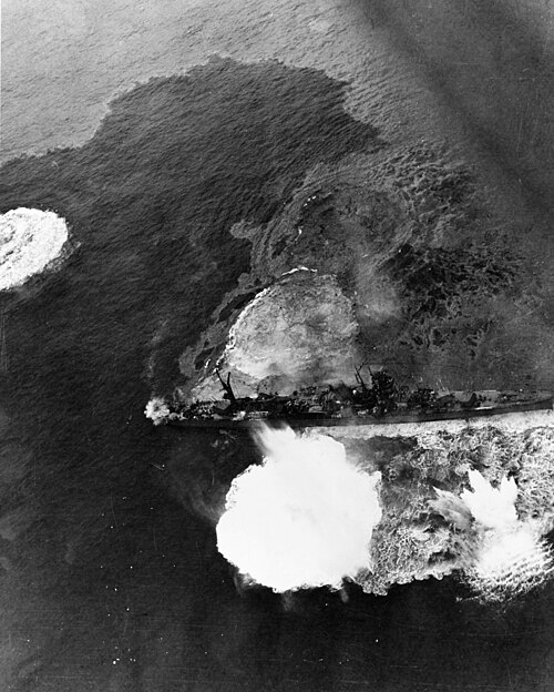 Light cruiser Yahagi under intense bomb and torpedo attack