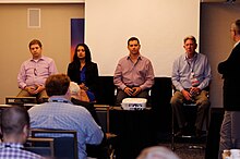 A JCP representative (far right) speaks to the trade press during a panel discussion at the JavaOne conference in 2012 Java press panel at JavaOne 2012.jpg