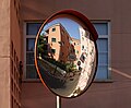 Image 751Jules and Gabriel reflected on a traffic mirror near Jardim Fernando Pessa, Lisbon, Portugal