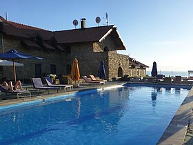 Hotel pool with a lake view