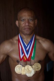 Lee Kemp with his 7 gold medals.jpg