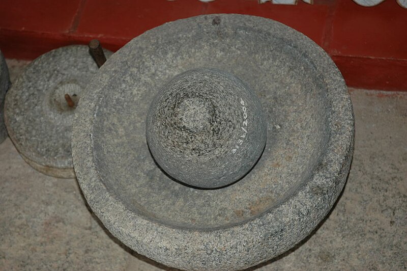 File:Manual stone grinder for grains wet dry.jpg