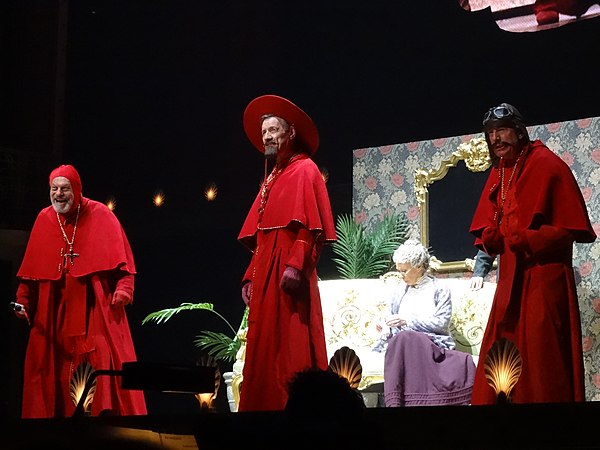 Gilliam, Palin and Jones performing "The Spanish Inquisition" sketch during the 2014 Python reunion. As a sketch writer and creator of animations, Gil
