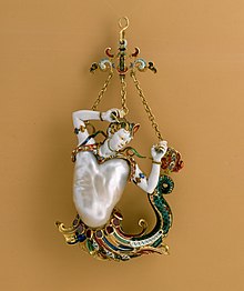 Pendant in the form of a siren, made of a baroque pearl (the torso) with enameled gold mounts set with rubies, probably circa 1860, in the Metropolitan Museum of Art (New York City, New York) Pendant in the form of a siren MET DT7173.jpg