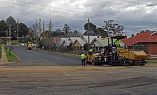 A road being resurfaced using a road roller Road resurfacing.jpg