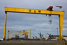 The gantry cranes Samson and Goliath (built in 1974 and 1969, respectively) have become symbols of the city of Belfast. Samson and Goliath 2018-07-27.jpg