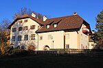 Beneficiary and school house in Maria Himmelfahrt