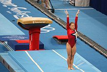 Shawn Johnson competes on vault during the team qualification. Shawn Johnson Olympics Vault.jpg