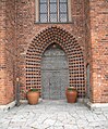 Part of the church tower (head door in to the church), from the west side.