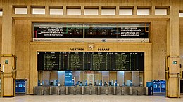 Main hall of Brussels Central Station, where the murder of Van Holsbeeck took place. Station Brussel-Centraal Loketten.jpg