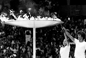 Lighting of the Olympic Torch inside Montreal's Olympic Stadium. The city hosted the 1976 Summer Olympics.