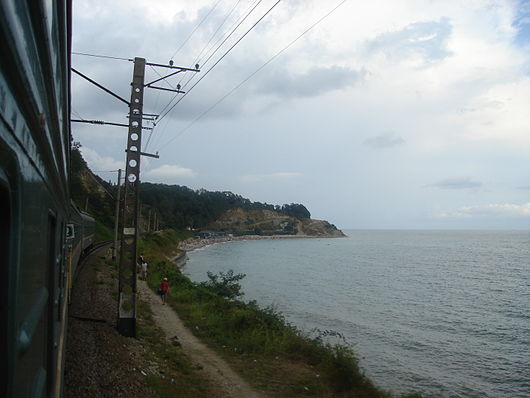 The Kazan-Adler train running along the coast of the Black Sea.
