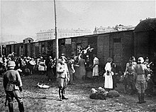 Jews being loaded onto trains to Treblinka at the Warsaw Ghetto's Umschlagplatz, 1942 Umschlagplatz loading.jpg