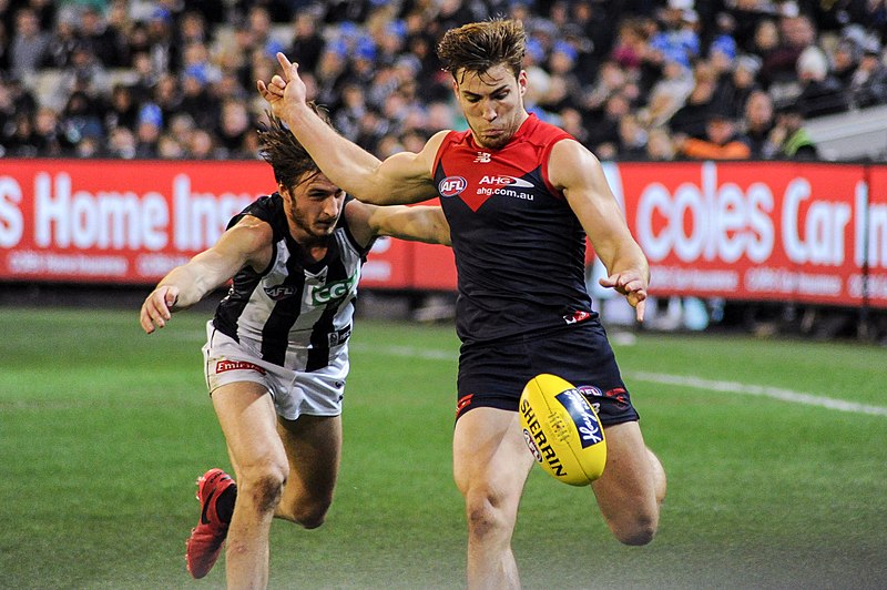 File:Viney kicking away from Phillips.jpg