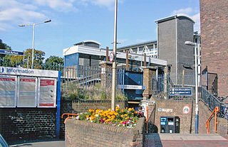 <span class="mw-page-title-main">West Byfleet railway station</span> Railway station serving the village of West Byfleet, Surrey, England