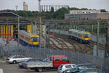 London Overground EMUs stabled at Willesden TMD Willesden Junction station MMB 20 Willesden TMD 378007 378015.jpg