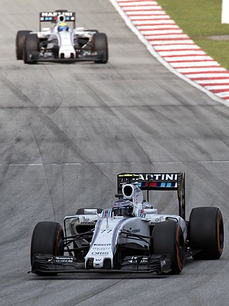 Valtteri Bottas leads teammate Felipe Massa at the 2015 Malaysian Grand Prix Williams duo 2015 Malaysia Race.jpg