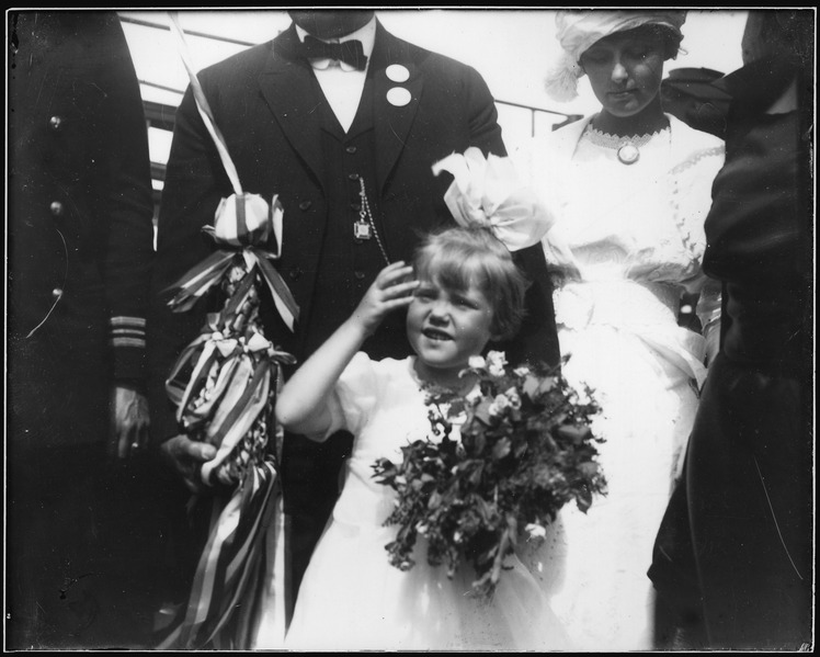 File:"USS CALIFORNIA (BB44) Launching Ceremony, Mrs Barbara Zane's little daughter, Majorie with the christening bottle... - NARA - 296905.tif