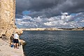 Image 859A couple of men angling in Valletta, Malta