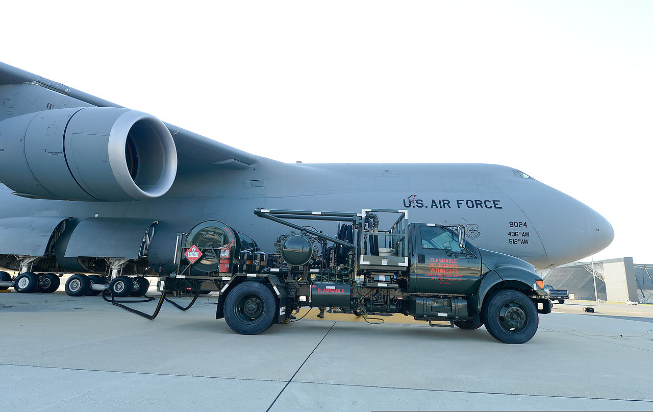 File:A fuel truck is staged as U.S. Airmen assigned to the 436th