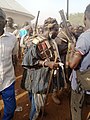 A warrior in his war regalia in northern Ghana